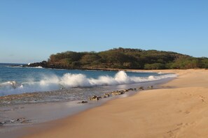 On the beach, sun-loungers, beach towels