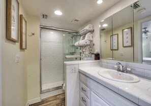 Shower, hair dryer, towels, soap