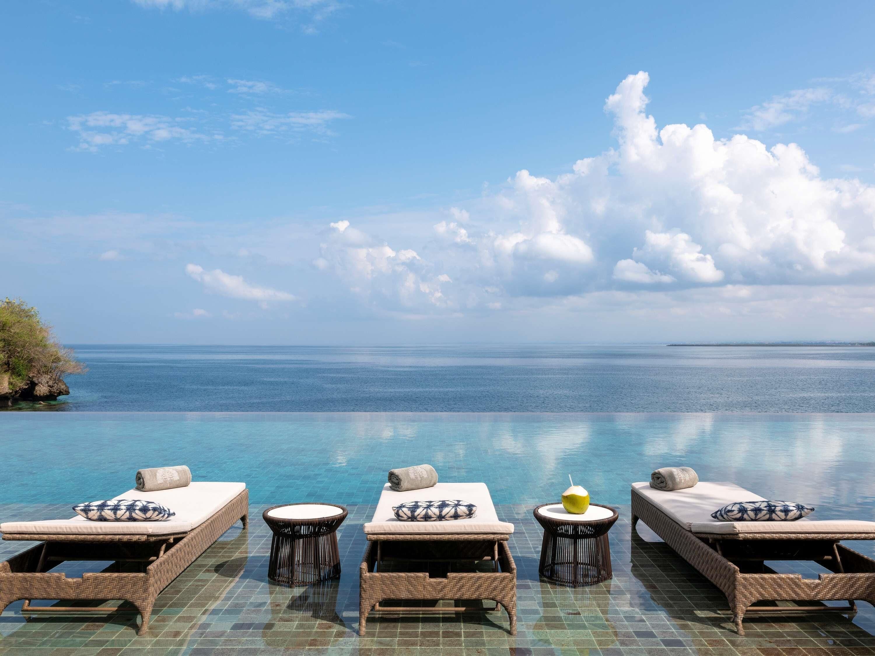 Outdoor pool, open 6:00 AM to 7:00 PM, pool cabanas (surcharge)