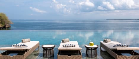Outdoor pool, open 6:00 AM to 7:00 PM, cabanas (surcharge)