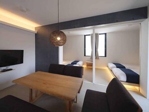 Suite, 2 chambres, non-fumeur | Coin séjour