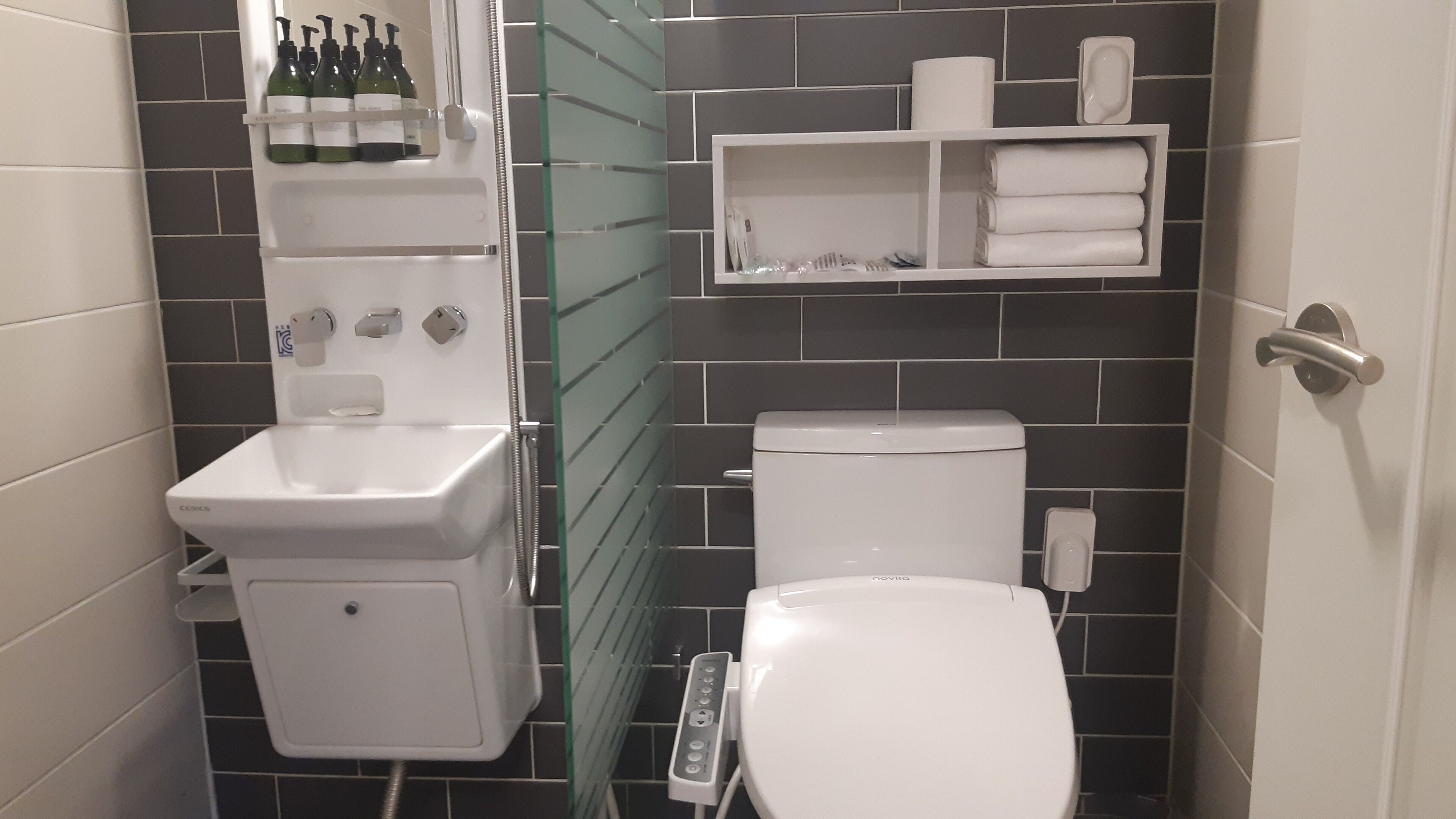double twin room | bathroom | shower, free toiletries, hair dryer, slippers