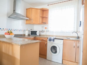 Fridge, microwave, dining tables