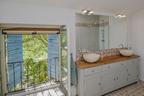 Bathtub, hair dryer, towels, soap