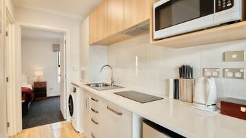 Apartemen, 1 kamar tidur | Dapur pribadi | Lemari es, microwave, kompor, dan mesin pencuci piring