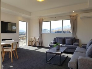 Duplex, 2 Bedrooms | Living area | Flat-screen TV