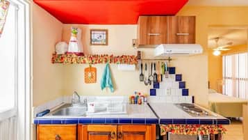 Apartment, 1 Bedroom, Smoking, Patio | Private kitchen | Coffee/tea maker, cookware/dishes/utensils, dining tables