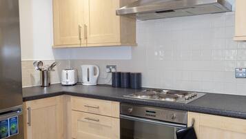 Apartment, 2 Bedrooms | Private kitchen | Full-sized fridge, microwave, oven, stovetop