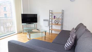 Apartment, 2 Bedrooms | Living room | 46-inch LCD TV with digital channels, TV, Netflix