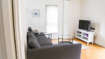 Apartment, 2 Bedrooms | Living room | 43-inch plasma TV with digital channels, TV, Netflix