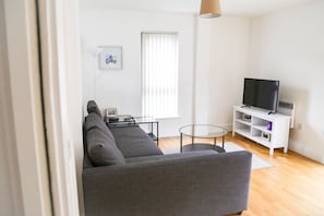 Appartement, 2 chambres | Salle de séjour | Télévisions à écran plasma, Netflix, services de streaming