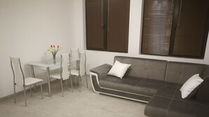 Apartment, 1 Bedroom, Smoking, Balcony | Dining room - The White House in Palamartsa (Popovo)