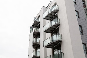 A modern building with multiple balconies and large windows. - Henry Street - Apt 47 (Liverpool)