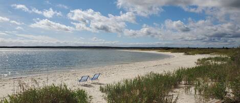 On the beach, sun-loungers, beach towels