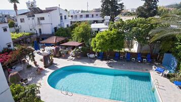 Room, 1 Bedroom, Smoking, Balcony | Pool | Outdoor pool