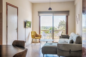 Room, 1 Bedroom, Smoking, Balcony | Living room | TV, books - Room-spacious One Bedroom Apartment in P (Polis)