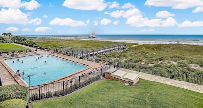 Oceanfront Beach Condo with Private Balcony, Short Walk to Pool and Beach by RedAwning