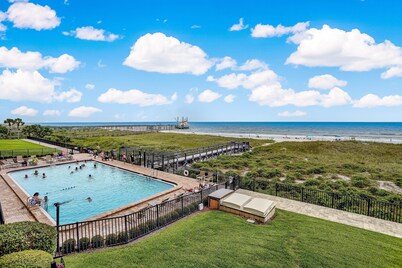 Oceanfront Beach Condo with Private Balcony, Short Walk to Pool and Beach by RedAwning