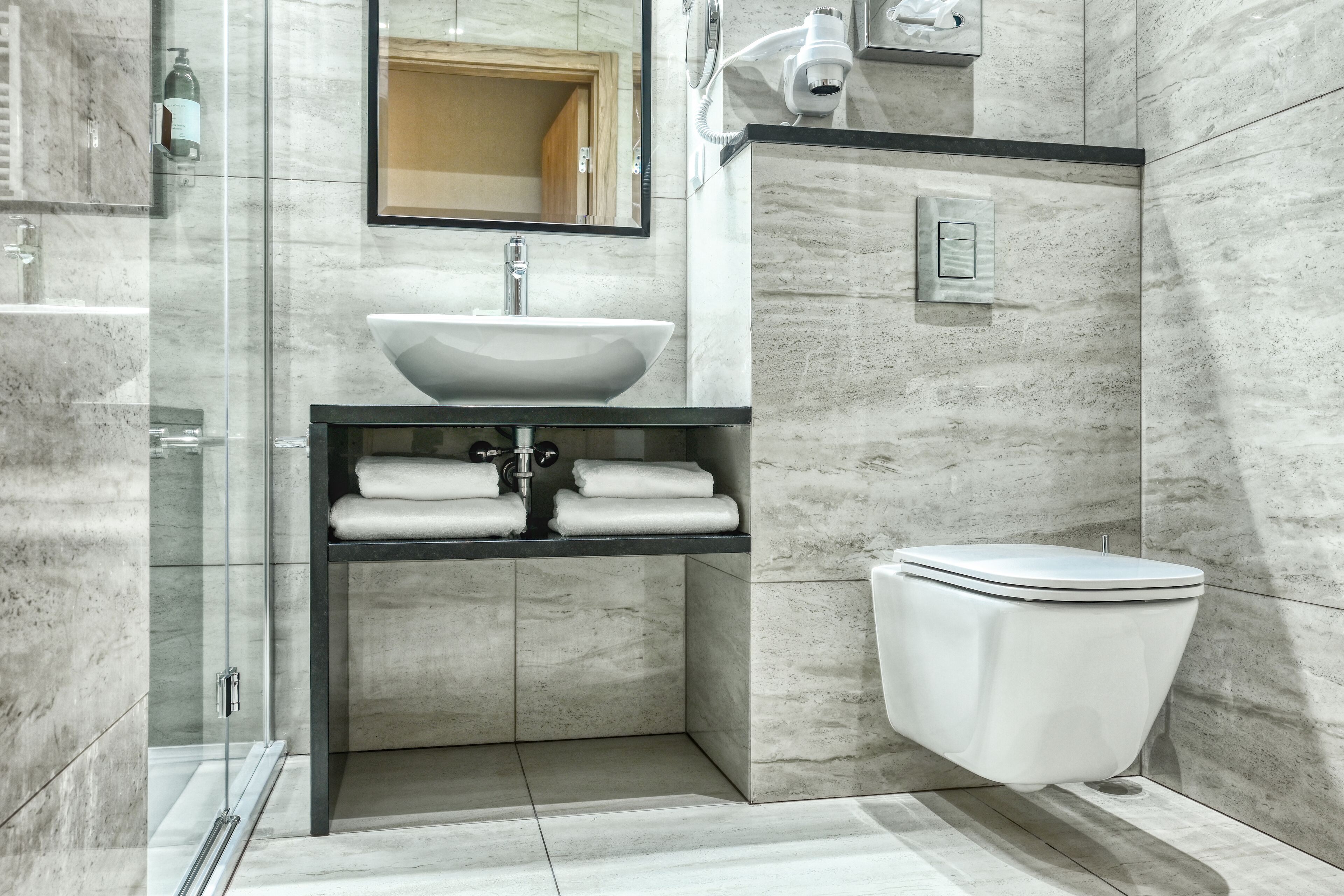 shower, free toiletries, hair dryer, towels