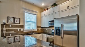 Oven, stovetop, dishwasher, cookware/dishes/utensils - Miramar Beach Villas 106 - 290100 (Miramar Beach)