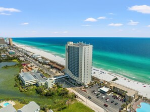 A high-rise hotel with a view of the beach and ocean. - Sterling Breeze 1904 (Panama City Beach)