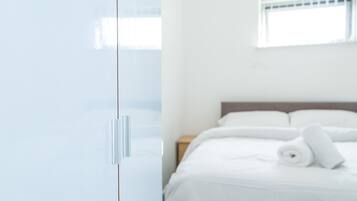 Apartment, 2 Bedrooms | 2 bedrooms, blackout curtains, iron/ironing board, travel cot