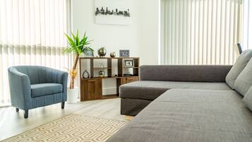 Apartment, 2 Bedrooms | Living room | 46-inch plasma TV with digital channels, TV, Netflix