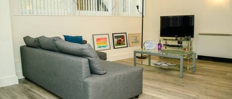 Apartamento | Sala de estar | Una televisión de pantalla plana, Netflix, servicios de streaming