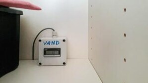 A white device labeled 'VAND' on a white wall with a black object to its left. - 4 Star Holiday Home in Hemmet (Hemmet)