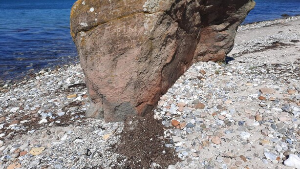 A large rock formation near a body of water. - 5 Star Holiday Home in Sydals (Sydals)