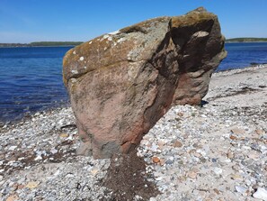 A large rock formation near a body of water. - 5 Star Holiday Home in Sydals (Sydals)