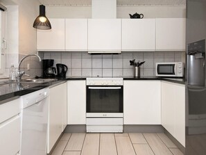 House | Private kitchen | Fridge, microwave, stovetop, dishwasher - Luxurious Cabin With Pool in Ringkøbing (Ringkobing)