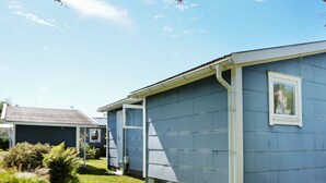 A single-story building with a flat roof and a small porch area. - 6 Person Holiday Home in Falkenberg (Falkenberg)