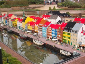A model of a canal with colorful buildings and boats. - Cozy Holiday Home in Hovborg near Community Area (Hovborg)
