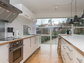 House | Private kitchen | Highchair - Gorgeous Holiday Home in Ebeltoft with Hot Tub (Ebeltoft)