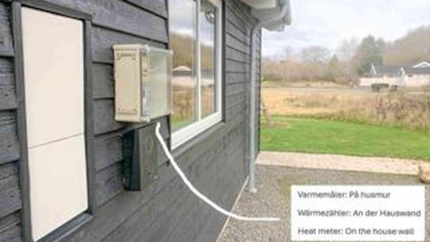 A house with a visible window, a wall-mounted heater, and a heat meter on the house wall. - 4 Star Holiday Home in Tranekaer (Tranekaer)