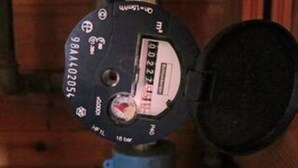 A device with a label, a circular dial, and a small window. - 5 Person Holiday Home in Harboore (Harboore)