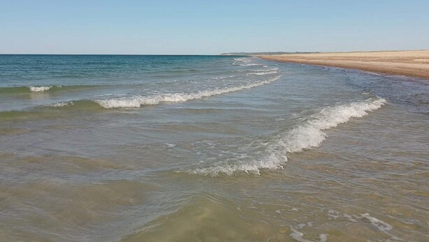 A beach with clear water and a sandy shore. - 5 Star Holiday Home in Fjerritslev (Fjerritslev)