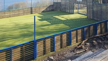 Maison | Terrain de sport