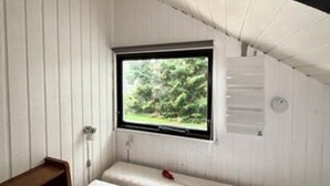 A room with a window, a white wall, and a white ceiling. - 6 Person Holiday Home in Hals (Hals)