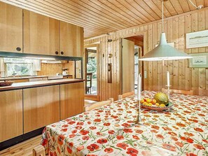 Fridge, stovetop, dishwasher, coffee/tea maker
