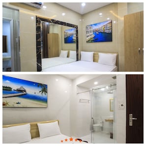 A hotel room with a bed, a shower, and a bathroom.