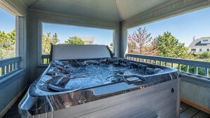 A hot tub with a view of a residential area. - Shore Thing - Corolla, Ocean Sands, 60 Yards to Beach, Ocean View, Pool, Hot Tub, Pets OK (Corolla)