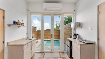 Microwave, coffee/tea maker, toaster, cookware/dishes/utensils