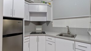 Fridge, microwave, stovetop, coffee/tea maker