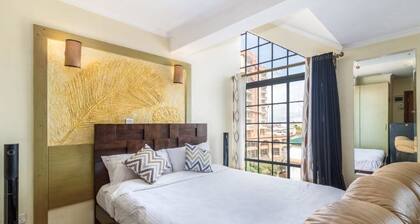 Kasri Loft @Mvuli. Stylishly furnished. Fast wifi. Cosy