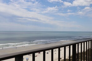 On the beach, sun loungers, beach towels