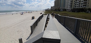 On the beach, sun-loungers, beach towels