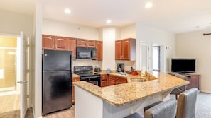 Coffee/tea maker, fridge, microwave, oven