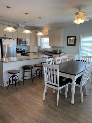 Amazing sunsets and ocean breezes await you at this beautiful beach view home.